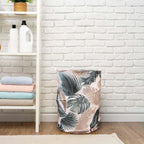 Cesto ropa plegable hojas tropicales