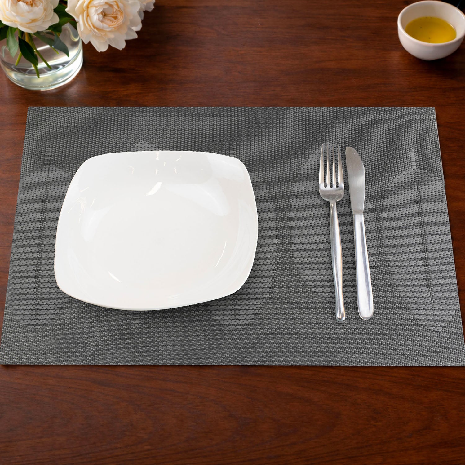 Individual de mesa 45x30cm reversible hojas gris